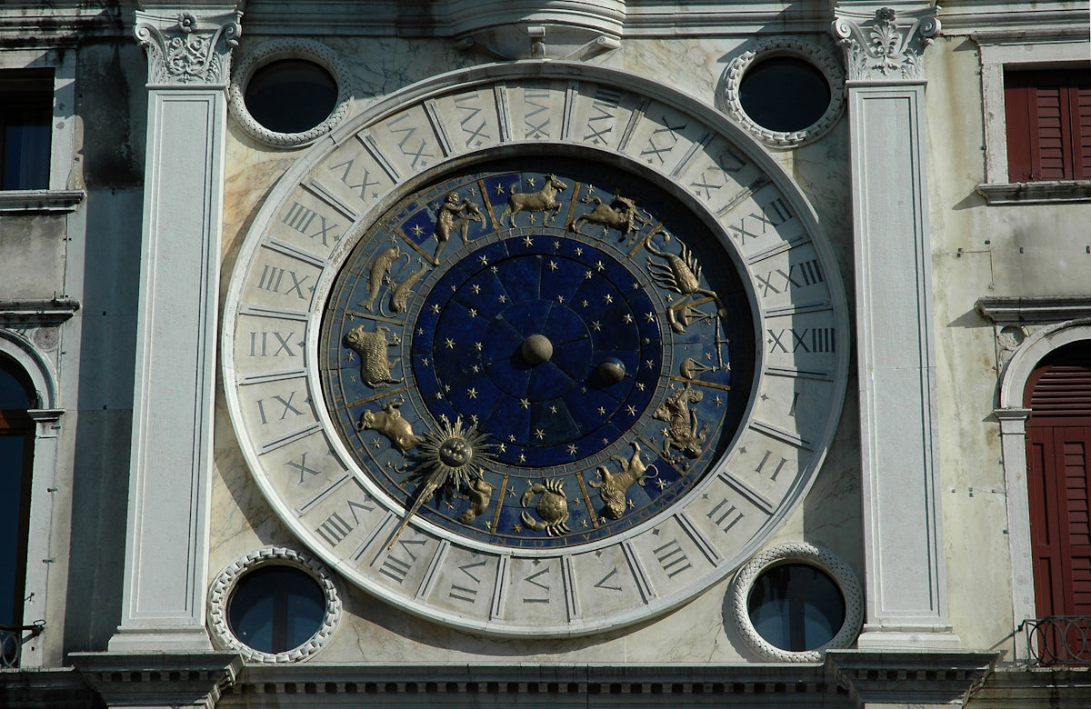 a large clock on the side of a building